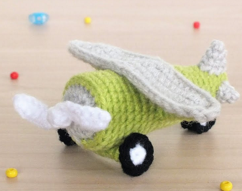 crocheted airplane with wheels