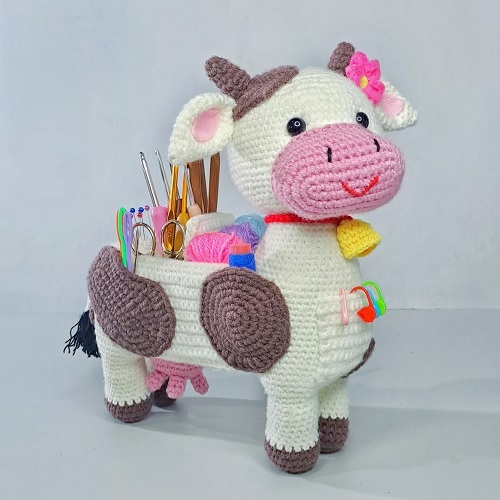 Cow shaped holder