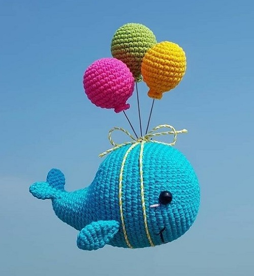 whale with balloons