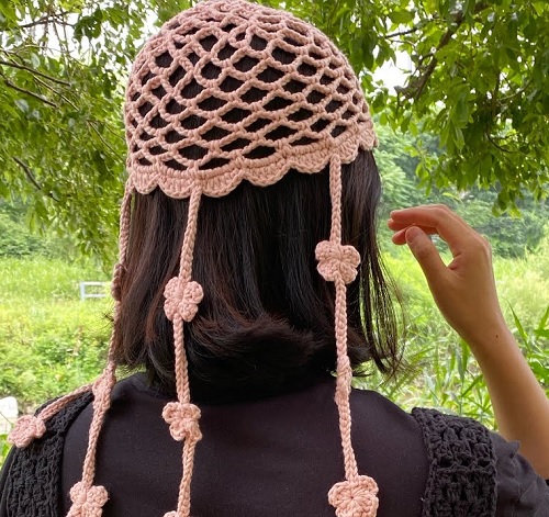 lacy hat with flower